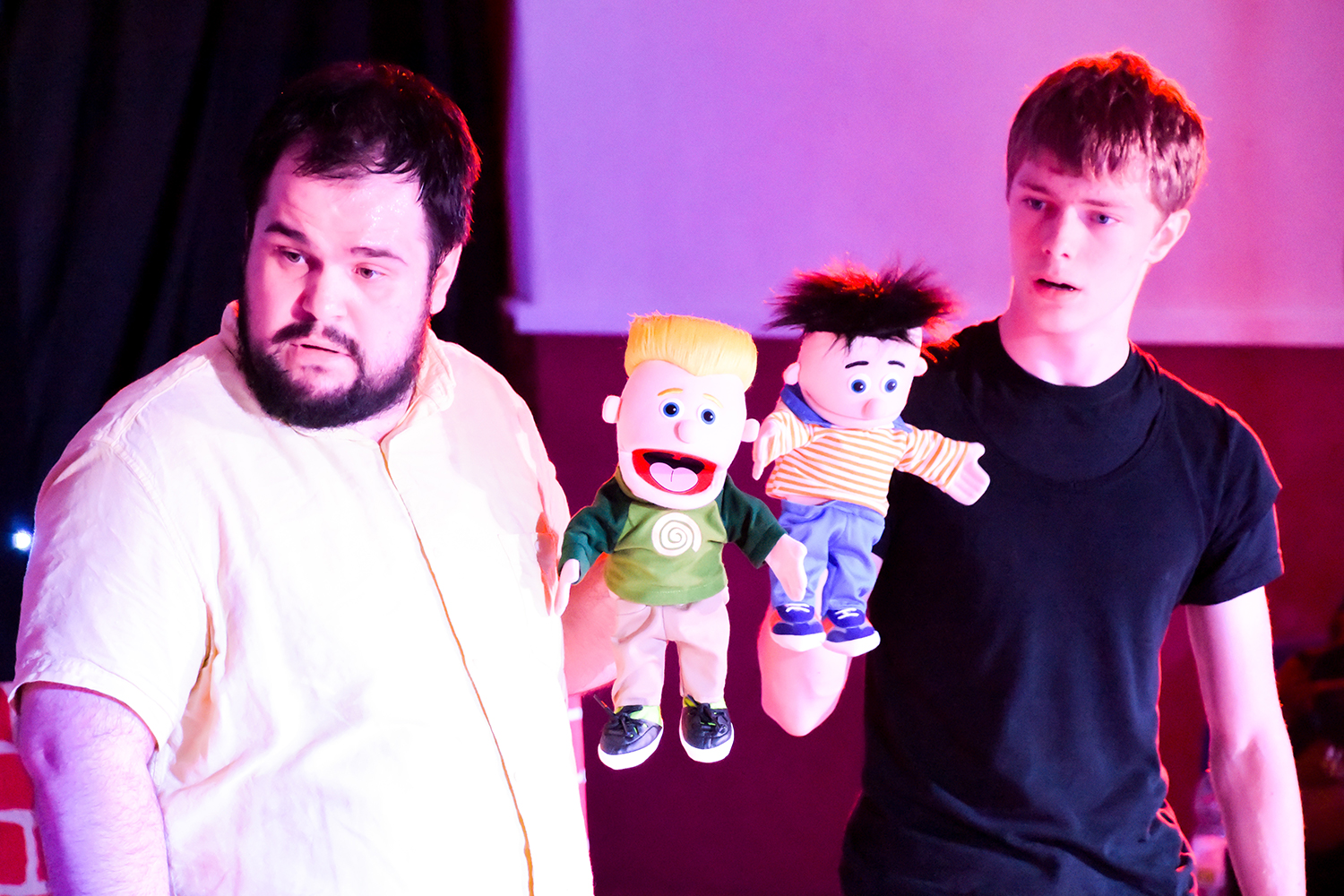 Nine Lives Theatre Company Students in performance with puppetry.